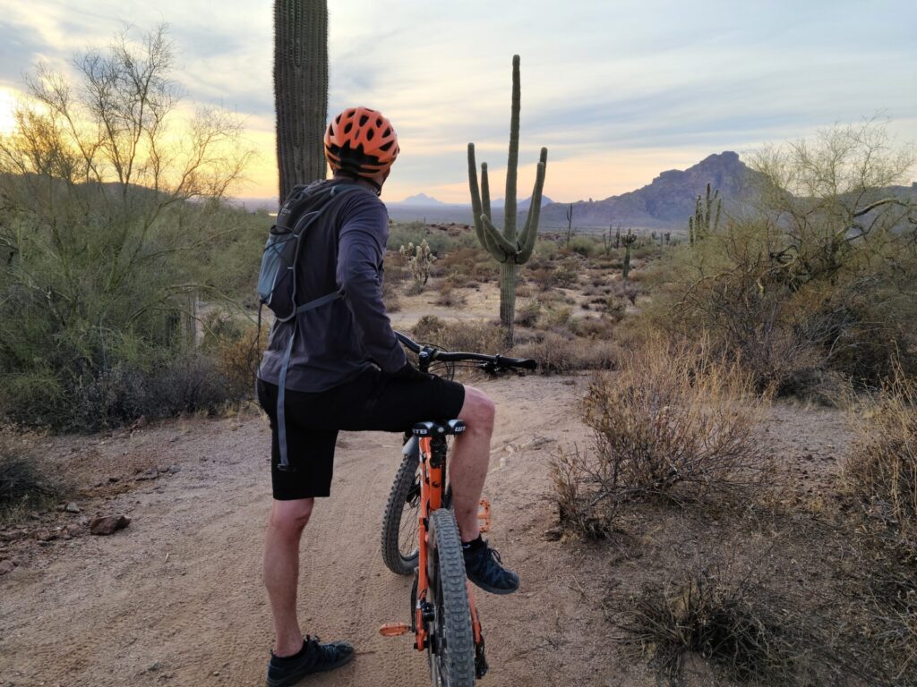Person mountain biking in the desert: one of the best thrilling activities in Phoenix
