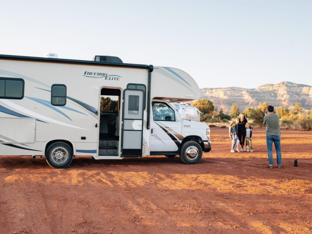 Family in front of an RV