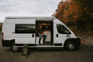 man in the front of campervan