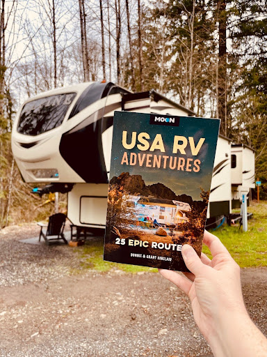 usa rv adventure map with rv in the backdrop 